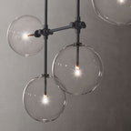 Glass Globe Mobile Linear Chandelier 60"